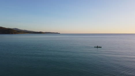 Drone-shot-of-serene-beach-during-sunset