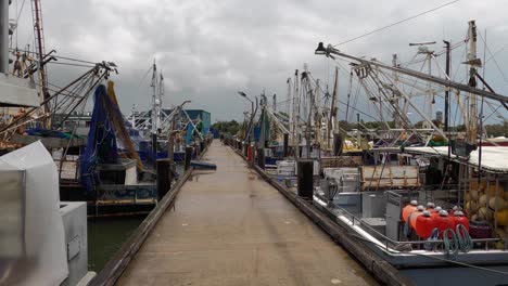 Commercial-fishing-boats-moored-at-a-wharf-and-dock