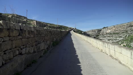 Road-Leading-From-Magrr-Ix-Xini-Bay-Beach-into-Mountains-Near-Canyon-in-Gozo-Island