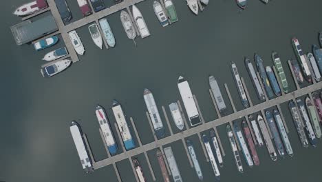 Marina,-Boat-Mooring,-Narrowboat,-Leisure-Cruiser,-Bird's-Eye-View-Aerial-Overhead-UK-Dull-Day-Water-4K-Travel-Transportation