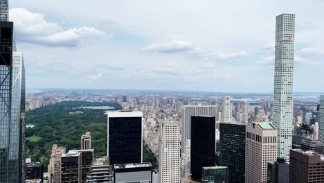 Aerial-view-of-Central-Park-in-Manhattan-with-New-York-City-slim-skyscrapers-of-Billionaires-Row