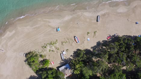 Aerial-top-down-forward-over-Playa-Dorada-or-Golden-Beach,-Puerto-Plata-in-Dominican-Republic