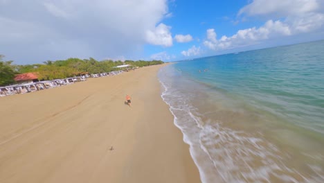Drone-flying-over-Playa-Dorada-or-Golden-beach-at-Puerto-Plata-in-Dominican-Republic
