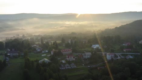 Small-village-in-Solina-lake-summer-fog