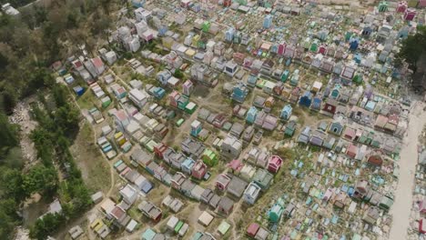 Aerial-footage-moving-from-right-to-left-over-a-colorful-cemetery-in-the-city-of-Chichicastenango-in-northern-Guatemala