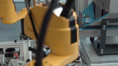 Robotic-arms-working-on-a-production-line