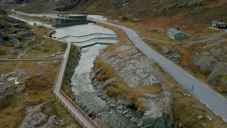 Trollstigen-is-a-serpentine-mountain-road-and-pass-in-Rauma-Municipality,-Møre-og-Romsdal-county,-Norway