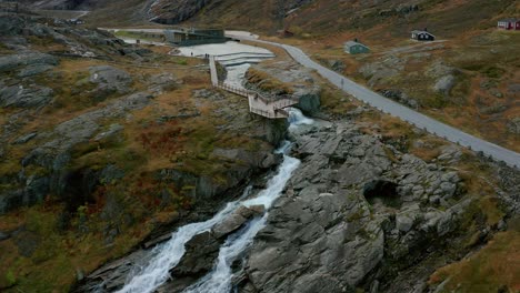 Trollstigen-is-a-serpentine-mountain-road-and-pass-in-Rauma-Municipality,-Møre-og-Romsdal-county,-Norway