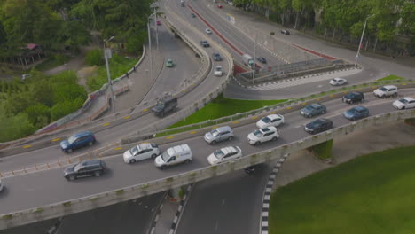 Descending-aerial-shot-revealing-a-congested-highway-junction