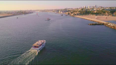 Drone-view-of-a-boat-at-Newport-Beach-in-California