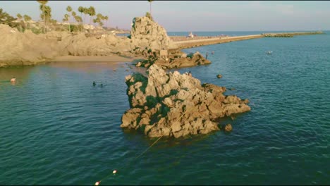 Drone-view-of-a-big-rock-at-Newport-Beach