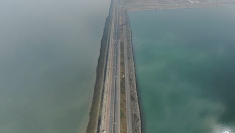 a-breakwater-road-that-separates-the-sea