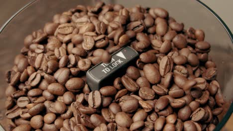 Slow-Motion:-Coffee-Bean-Falls-into-Coffee-Beans-Grinder-container