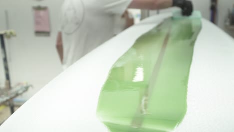 slow-motion-surfboard-epoxy-paint-squeegee