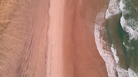 Gold-coast-Australia-sunrise-beach-drone-video-of-waves-crashing-on-the-beach-in-Surfers-paradise