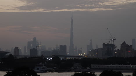 Distant-Dubai-skyline-with-Burj-Khalifa-at-sunset