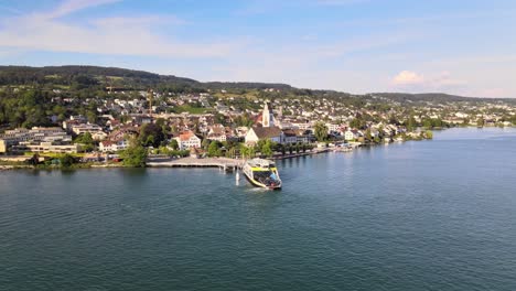 Aerial-drone-shot-rotating-around-car-ferry-at-Meilen-in-Switzerland
