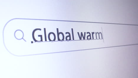 Browser-bar-with-typed-Global-warming-keyword-on-the-computer-screen,-SEO-Concept