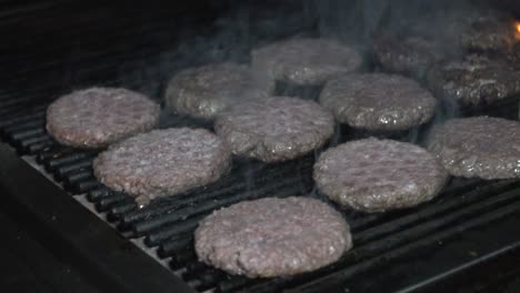 Delicious-beef-burger-cooking,-hot-barbecue-grill