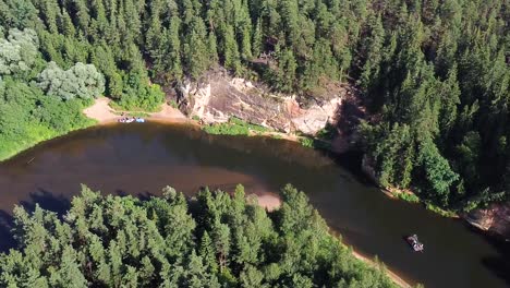 Rotating-aerial-drone-view-of-Gauja-river-in-summer-in-Latvia
