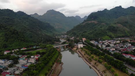 Aerial-Dolly-over-river-at-Muong-Lay,-Vietnam