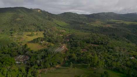 Jib-down-with-drone-above-fields-in-Colombia-at-a-cloudy-day