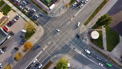 Busy-street-intersection-on-rush-hour,-aerial-top-down-shot