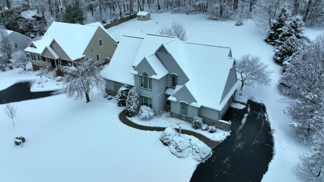 Pullback-reveal-of-upscale-single-family-homes-real-estate-in-winter-snow
