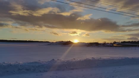Driving-Past-Golden-Sunset-Past-Farm-Buried-In-Deep-Snow-In-Hokkaido
