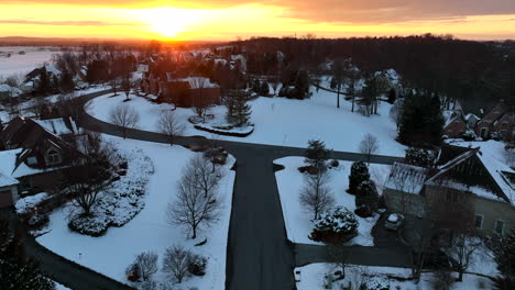 American-neighborhood-community-in-winter-snow-at-sunset