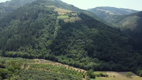 Aerial-view-of-huge-green-mountains-in-Asturias,-Spain