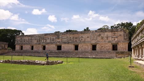 Tourist-walking-around-of-the-ruins-of-the-antique-city-of-Uxmal
