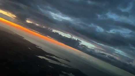 Aerial-view-from-a-cockpit-during-a-left-turn-over-Menorca-Island-durind-dawn