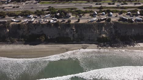 A-stunning-static-aerial-drone-shot-of-the-coast-and-beach,-Carlsbad-State-Beach---California