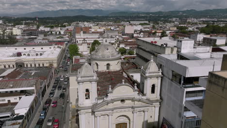 Slow-aerial-rotating-footage-around-a-church-in-Guatemala-City