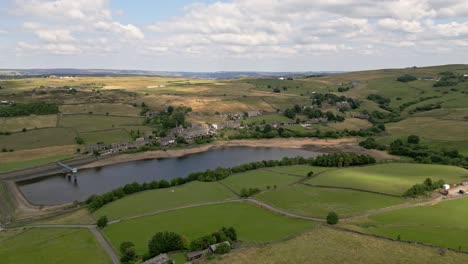 Aerial-drone-footage-of-a-quite-Yorkshire-Village-with-a-mill-chimney
