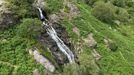 Drone-aerial-footage-of-the-Taylor-Gill-Force-Waterfall-at-Borrowdale,-Seathwaite-and-is-one-of-the-highest-waterfalls,-in-the-Lake-District-National-Park