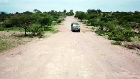 4x4-Toyota-Land-Cruiser-Safari-Vehicle-Driving-On-Dirt-Road-In-Kenya