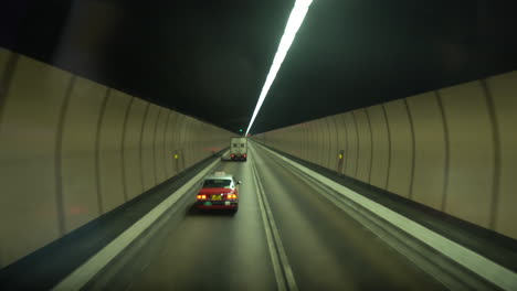 Bus-Driving-Through-A-two-way-Tunnel-With-Light-on-the-top