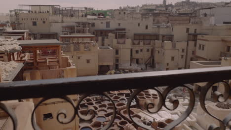Dynamic-tannery-establishing-shot-in-the-heart-of-the-city-of-Fes,-Morocco
