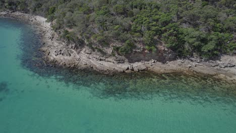 Rocky-Coast-And-Vegetation-In-Great-Keppel-Island,-Queensland,-Australia---aerial-drone-shot
