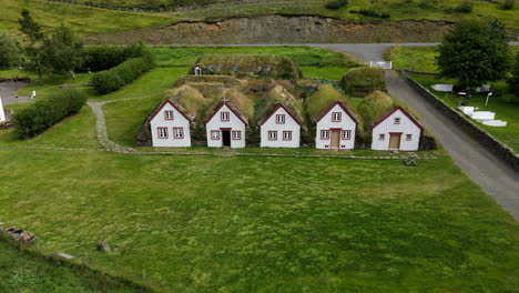 Aerial-close-circular-shot-of-the-famous-turf-houses-of-Iceland