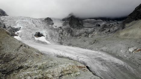 Aerial-flyover-towards-the-Moiry-glacier-near-Grimentz-in-Valais,-Switzerland