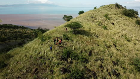 Hikers-climbing-a-mountain-with-beautiful-views-in-East-Africa