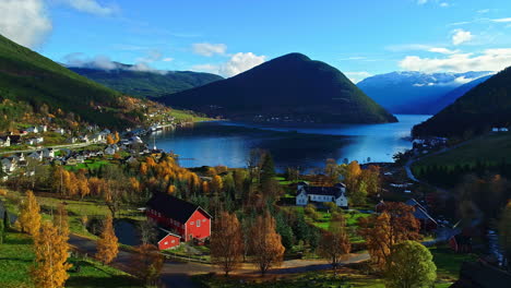Scenic-Kaupanger-Village-In-Autumn-With-Colorful-Small-Buildings-And-Houses-Situated-Along-The-Shore-Of-Sognefjord-In-Sogndal,-Vestland-County,-Norway