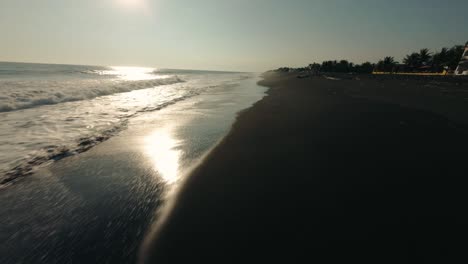 Foamy-Waves-Rolling-On-Black-Sand-Beach-Of-Monterrico-During-Sunset-In-Guatemala
