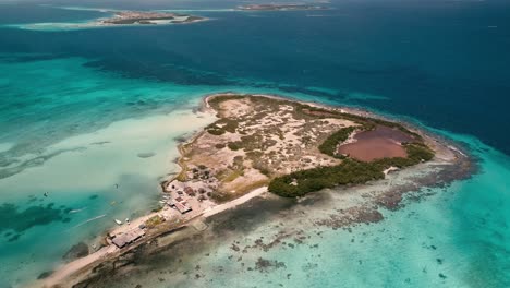 Tropical-scene-of-pink-lagoon-at-the-caribbean-island,-Aerial-view-Los-Roques