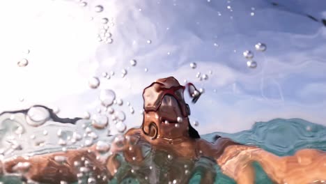 Unterwasser-Selfie-Eines-Kleinen-Rothaarigen-Mädchens-Mit-Tauchermaske,-Die-Eine-Kamera-Hält,-Während-Sie-In-Kristallklarem-Türkisfarbenem-Meerwasser-Schwimmt