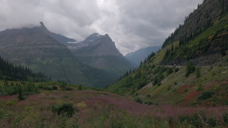 Beautiful-and-incredible-landscape-in-Glacier-National-Park-on-the-west-side-of-Logans-Pass-on-going-to-the-sun-road-with-fog-and-clouds-clinging-to-the-mountains