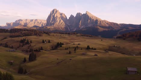 Drone-Flying-Away-from-Seiser-Alm-Alpine-Meadow-at-Sunset